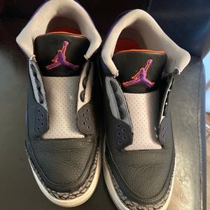 Orange and black and purple Jordan’s size 9